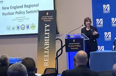 Rebecca Pepper, secretary of the Massachusetts Executive Office of Energy and Environmental Affairs, addresses summit attendees