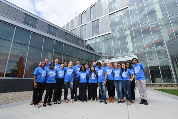 Manning School of Business students celebrate the grand opening of the Pulichino Tong Business Center in 2017, one of several game-changing facilities the campaign has helped make possible