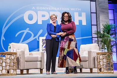 UMass Lowell Chancellor Jacquie Moloney with Oprah Winfrey at the Tsongas Center