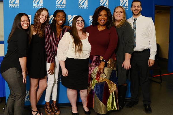 Oprah Winfrey with the first six students awarded scholarships in her name.