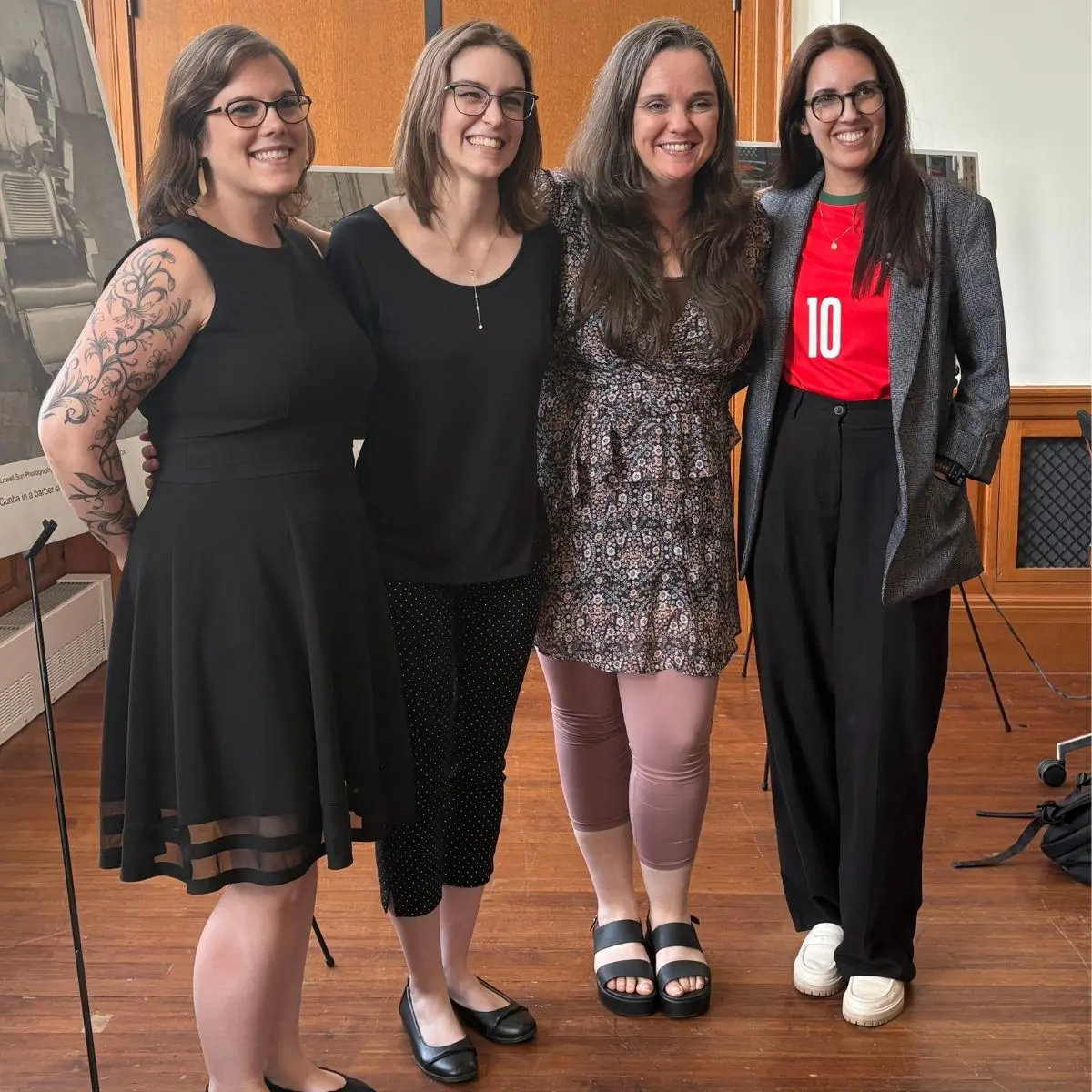 4 people pose at the Preserving Portuguese Immigrant History Symposium.