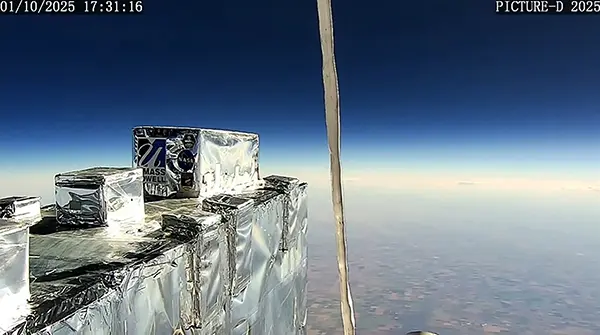 Image shows the PICTURE-D device high above the Earth's atmosphere.
