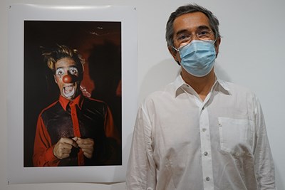 Portuguese Studies Visiting Prof. Pedro Letria with the clown photo from his show "Maskirovka"