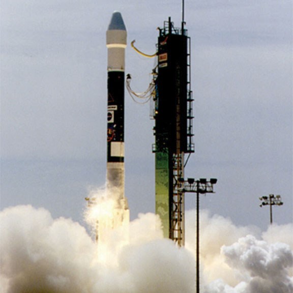 A NASA rocket detaching from base and taking off