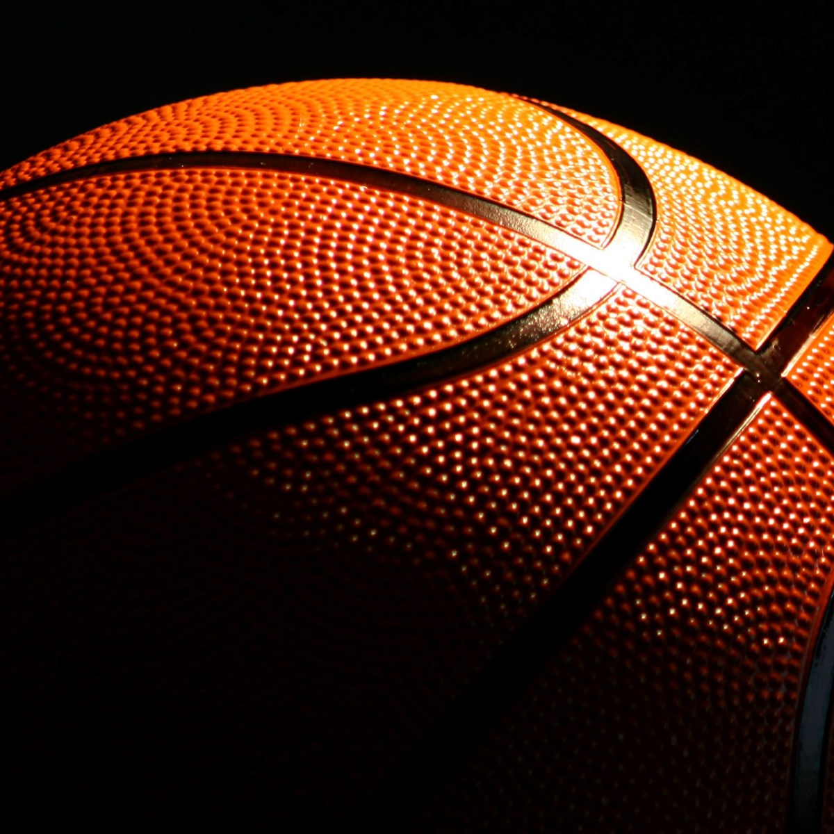 Basketball against black background