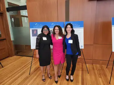  Urmitapa Dutta, Stephanie D. Block and Megan H. Papesh stand together at an event.