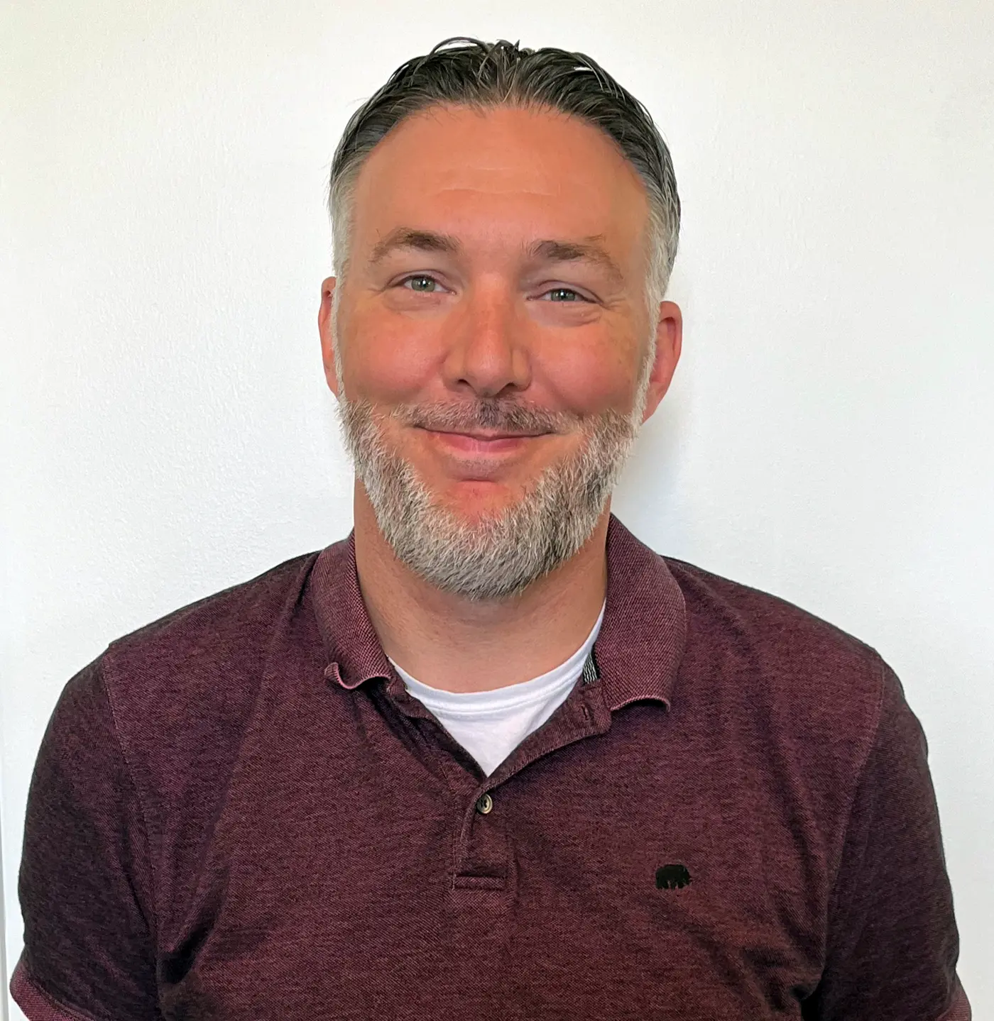 Michael Pueschel dressed as Rowdy The River Hawk at the WBZ studios.