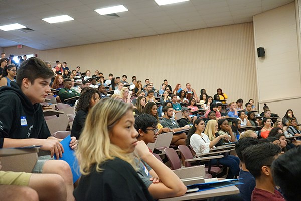 First-generation college students crowded into a lecture room for the River Hawk Scholars Academy's welcome day.