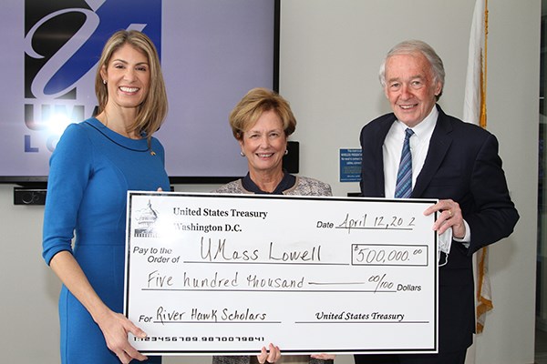 U.S. Rep. Lori Trahan, UML Chancellor Jacquie Moloney and U.S. Sen. Edward Markey hold a ceremonial check for $500,000 for the RHSA