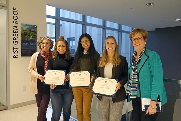 Chancellor Jacquie Moloney and Assoc. Prof. Juliette Rooney-Varga pose with the student project winners