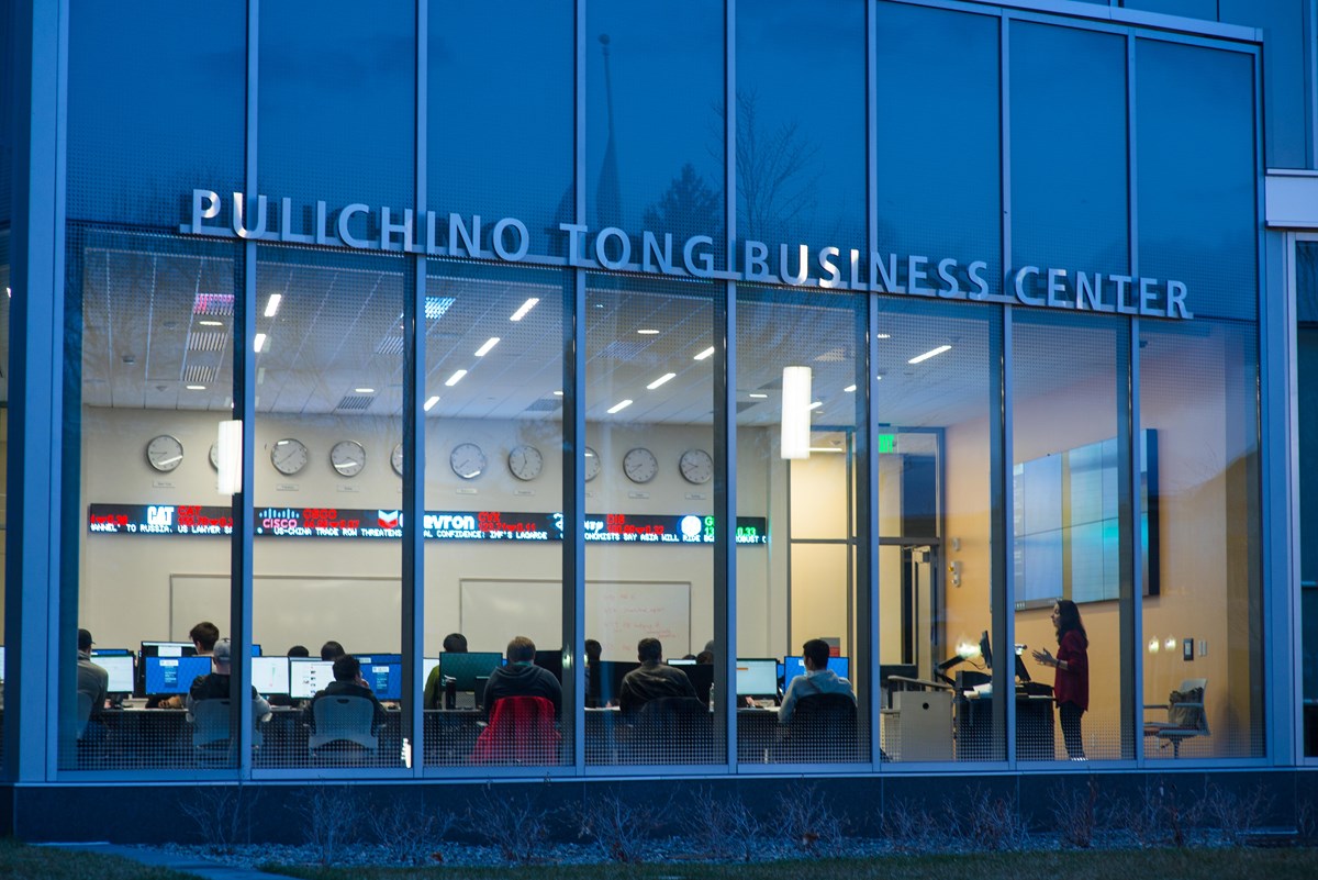Pulichino Tong Business center written on the front of the building.
