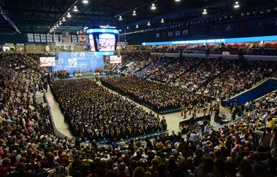 Graduates gathered on the floor of the Tsongas Center for UMass Lowell Commencement.