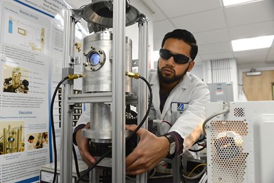 Student conducts experiment in Re-Engineered Energy Lab. The RE-ENGINEERED ENERGY LAB is researching how to use solar energy and electricity to develop new types of sustainable fuels and chemicals.
