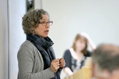 Juliette Rooney-Varga talking to a class