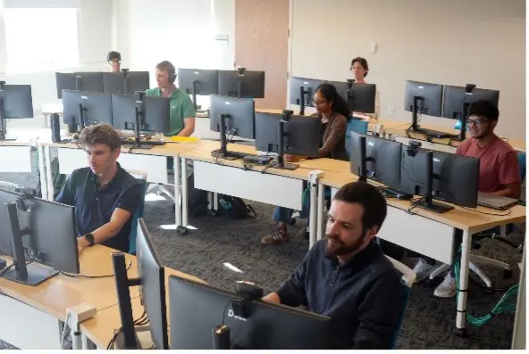 Students work at the new Security Operations Center.