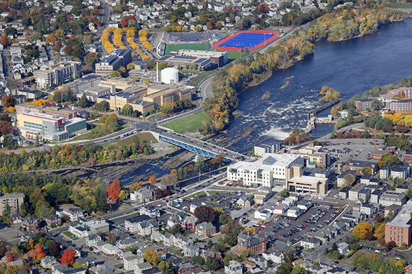 An aerial view of the Merrimack River running through the UML campus