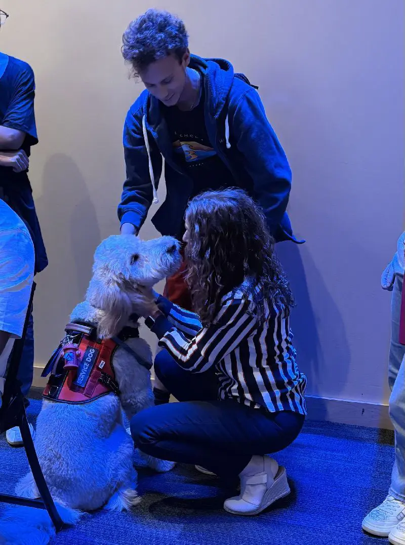 Service dog receives Honors pin at Induction ceremony