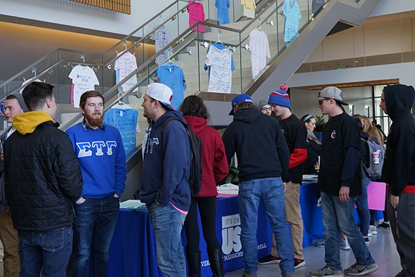 Fraternities at UML gather for the Take Back the Night March 2018