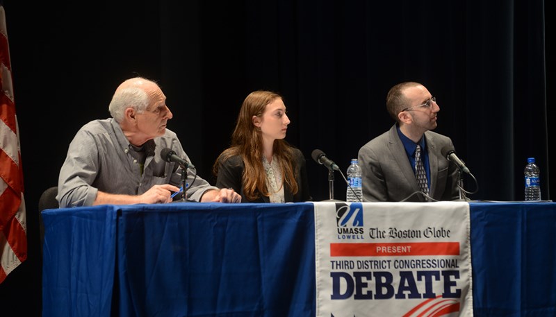 Shaila Bornstein on stage at Durgin Hall as one of the two student panelists for debates among the Democratic primary candidates for Niki Tsongas’ seat in Congress