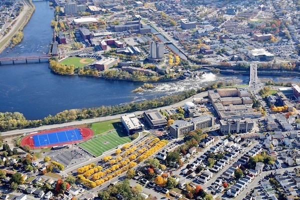 An aerial view of the UML campus and Merrimack River