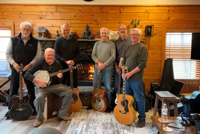 Group picture, left to right: Jeff Pfeiffer, Frank Smith (on banjo), Frank McLaughlin, Rich Goldman, Jere Anderson, and Ron Hamel