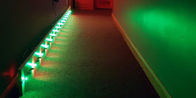 Prototype of the final product; a room with the LED lighting on one side of the wall.