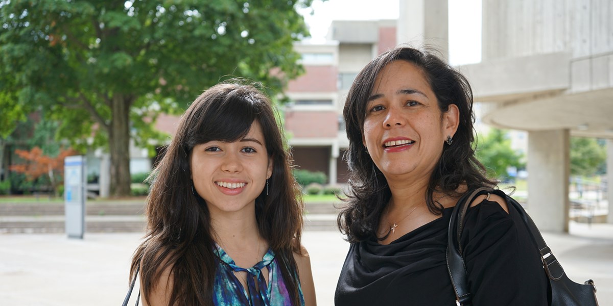 Sofia Savoca with her mom outside O'Leary Library on South Campus