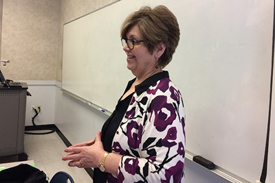 Tess George is teaching a class in public speaking for the Honors College at UML.