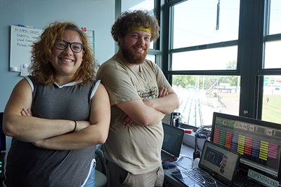 Denisse Torres and Anthony Gervase in the Spinners' video production booth