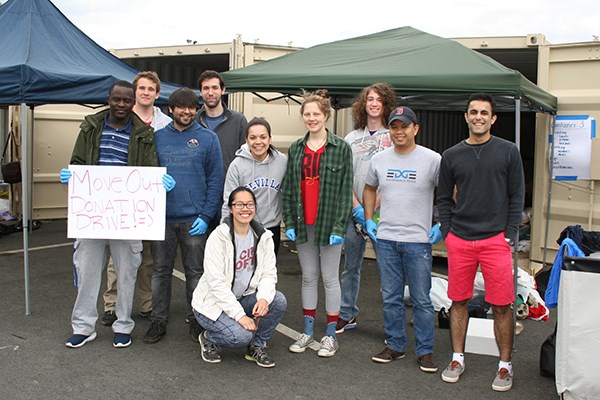Student volunteers pose at the donation sorting site