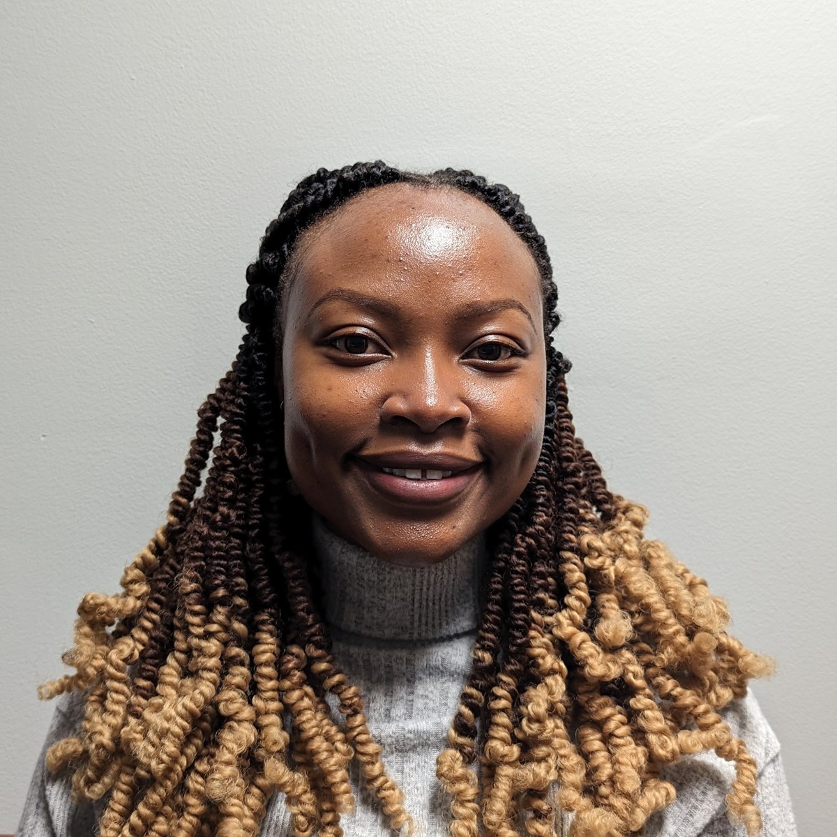 Lorna Omenya, alumni of the radiological sciences, headshot picture forward facing