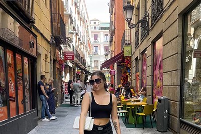 Honors math major Stephanie Guglielmo wanders a pedestrian street in Madrid near the Puerto del Sol