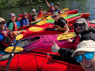 Student workers kayaking with Kate Ford and Kevin Soleil