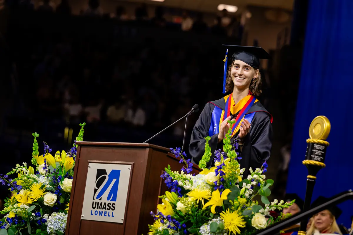 Sydney Selby delivers a speech at the UMass Lowell commencement ceremony.
