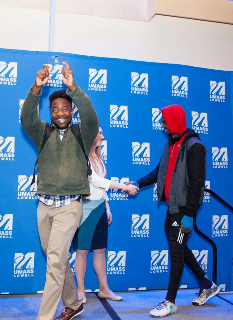 The T.A.P. team onstage accepting their Fan Favorite prize of $1,000 during the 2018 DifferenceMaker Idea Challenge