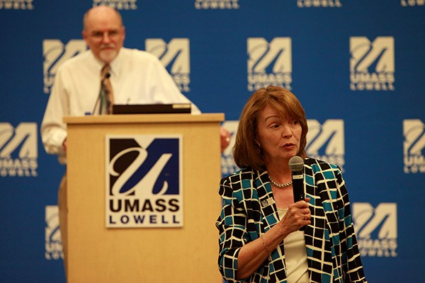 UMass Lowell College of Health Sciences Dean Shortie McKinnie and Economics Research Prof. David Turcotte at a community stakeholders meeting on opioids and the workplace
