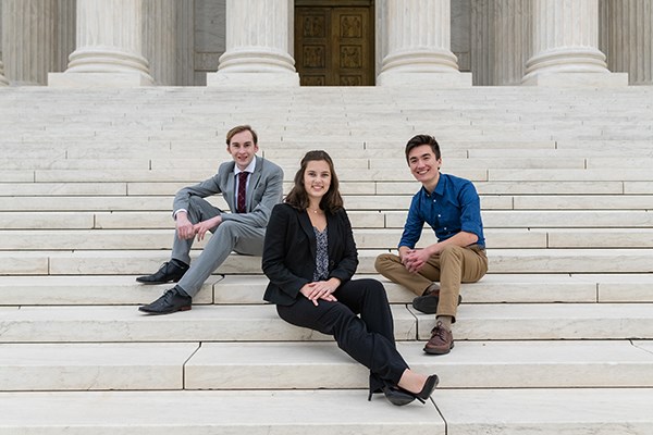 UMass Lowell political science students Ben Souza and Angela DiLeo and criminal justice major Justin Bouffard in Washington, D.C., fall 2021
