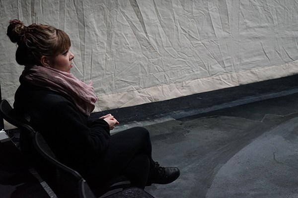 Technical theatre intern Rachael Bergeron watches intently from the sidelines during a rehearsal of "Macbeth" at UMass Lowell