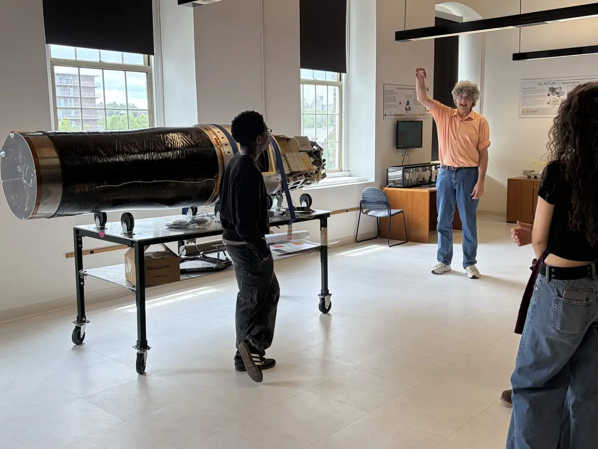 Timothy cook talking to a group of students