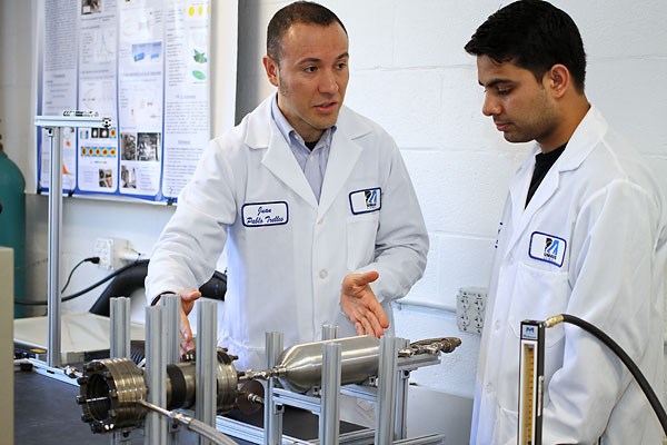 Asst. Prof. Trelles and his student in the lab