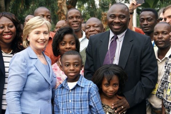 The Tsewole family pose with Hillary Clinton in the Congo