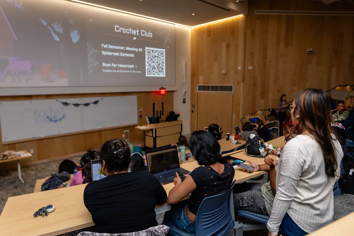 Students sitting in a lecture hall.