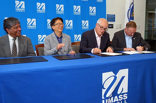 Leaders from UMass Lowell and Space Centre Australia on Wednesday signed a new AeroLabs Science Consortium Agreement to innovate airborne science, low-Earth orbit research and horizontal-launch innovation. Shown, from left, are Physics Professor Supriya Chakrabarti, who directs the Lowell Center for Space Science Technology at UMass Lowell (LoCSST); UMass Lowell Chancellor Julie Chen; Scott Morrison, former prime minister of Australia, who now serves as Space Centre Australia’s advisory chairman; and Space Centre Australia President and CEO James Palmer.