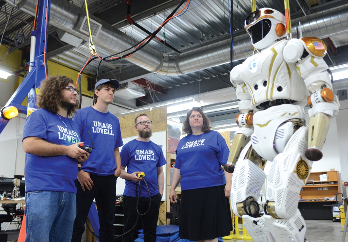 UMass Lowell student and faculty with NASA robot Valkyrie at the NERVE Center