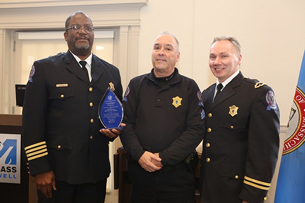 Chief Randy Brashears, Sgt. Mike Soucy and Deputy Chief Ron Dickerson pose with Soucy's Collier Award