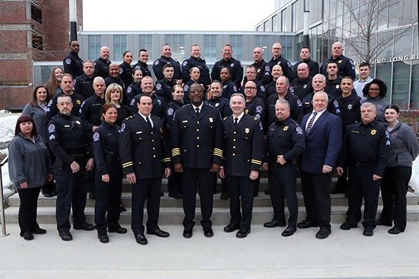 The UMLPD officers and staff pose for a group photo