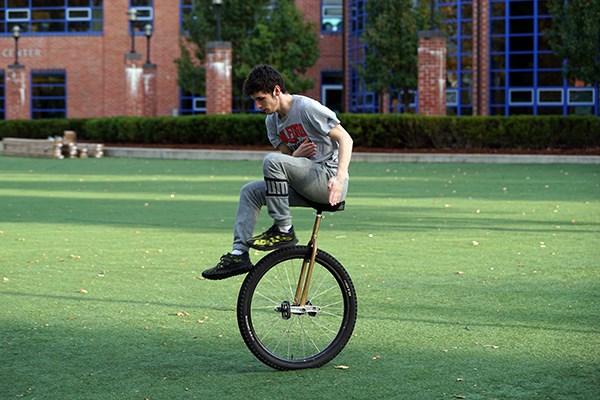 Andrew Terrill demonstrates his unicycle riding skills