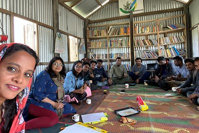 Assoc. Prof. Urmitapa Dutta facilitates a digital storytelling workshop with Miya community workers on the riverine island of Majidbhita Char.