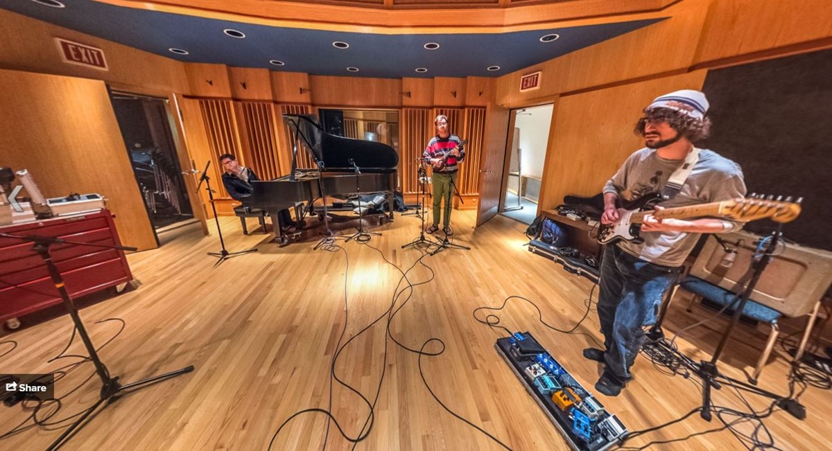 Musician recording in studio