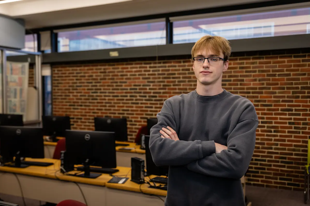 Viktor Akhonen in a UMass Lowell computer lab.